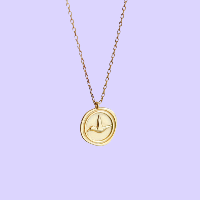 Sterling Silver Bird Coin Necklace
