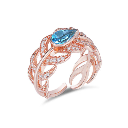 Adjustable Sterling Silver Swiss Blue Topaz Feather Ring
