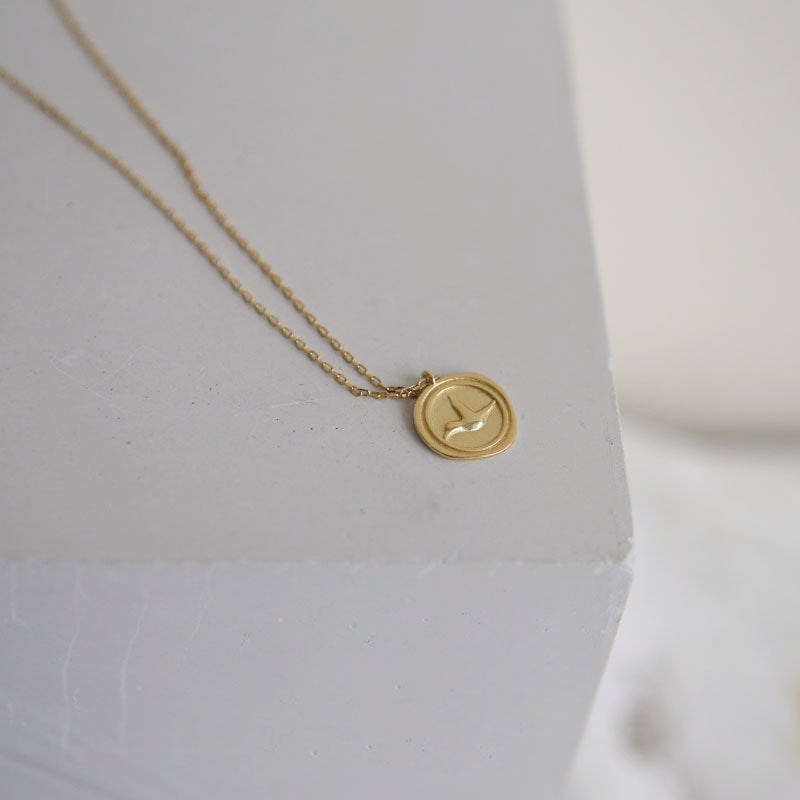 Sterling Silver Bird Coin Necklace