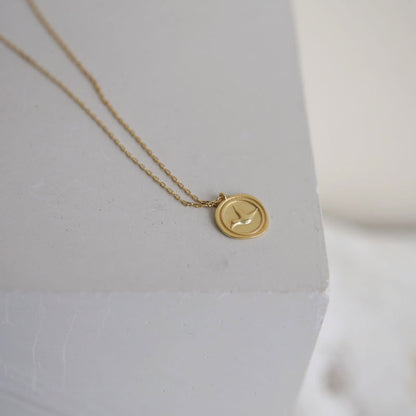 Sterling Silver Bird Coin Necklace