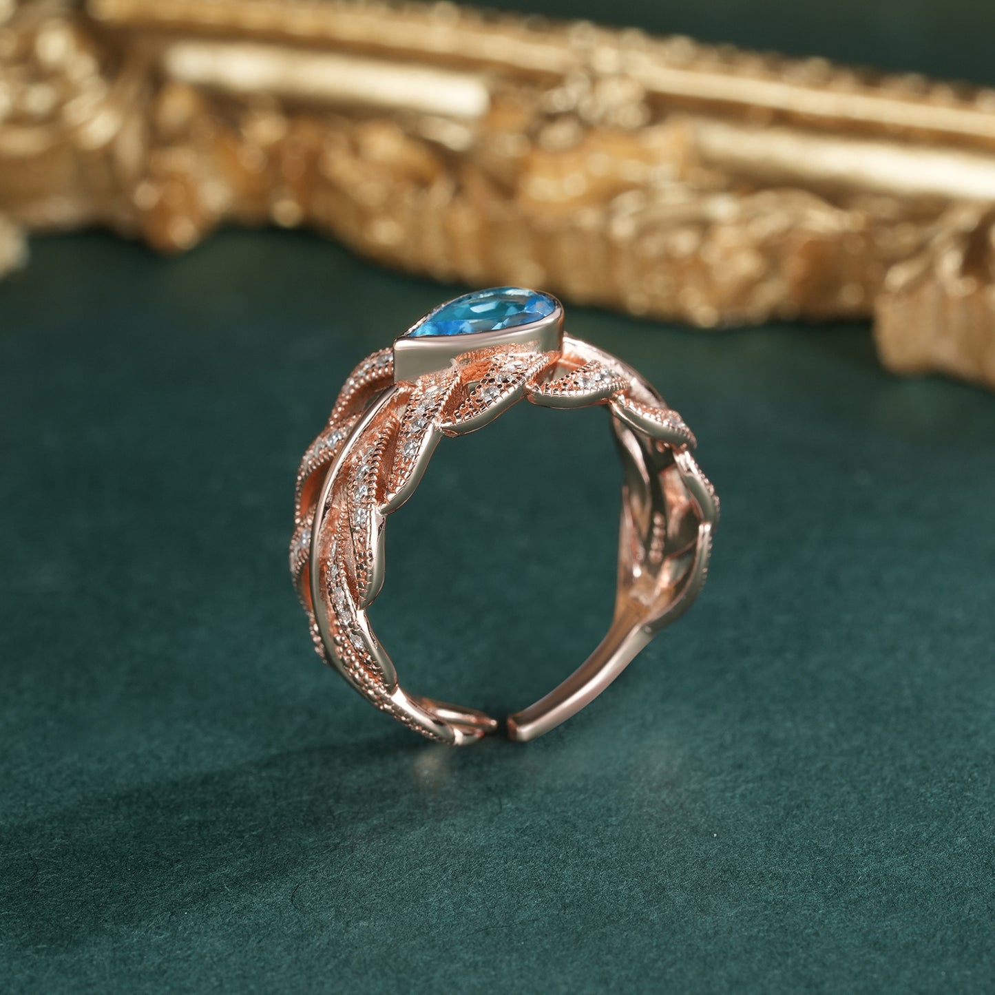 Adjustable Sterling Silver Swiss Blue Topaz Feather Ring