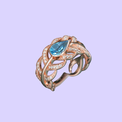 Adjustable Sterling Silver Swiss Blue Topaz Feather Ring