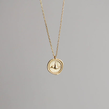 Sterling Silver Bird Coin Necklace