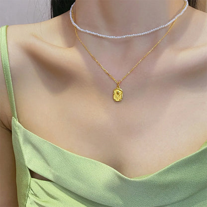 Sterling Silver Tulip Coin Necklace